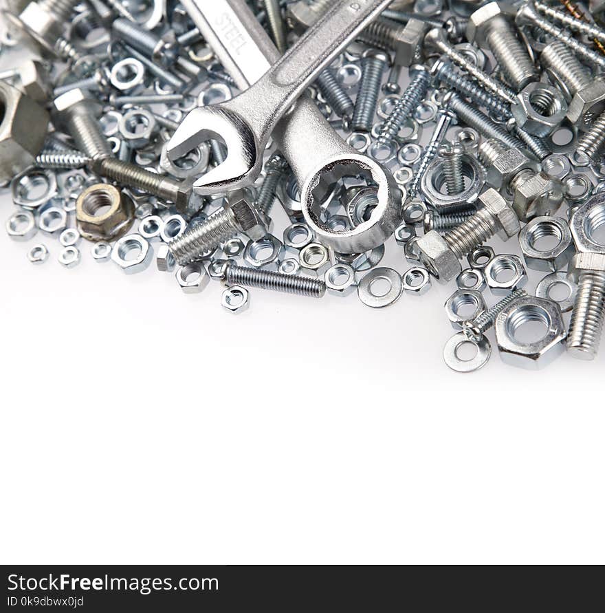 Wrenches on nuts and bolts. Wrenches on nuts and bolts