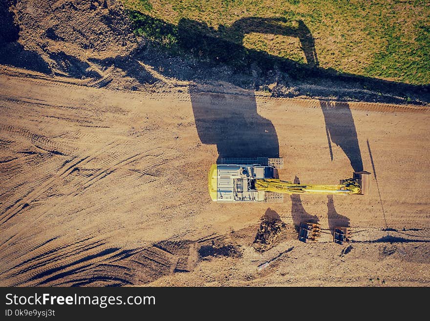 Drone shot of a excavator at sunset. Drone shot of a excavator at sunset