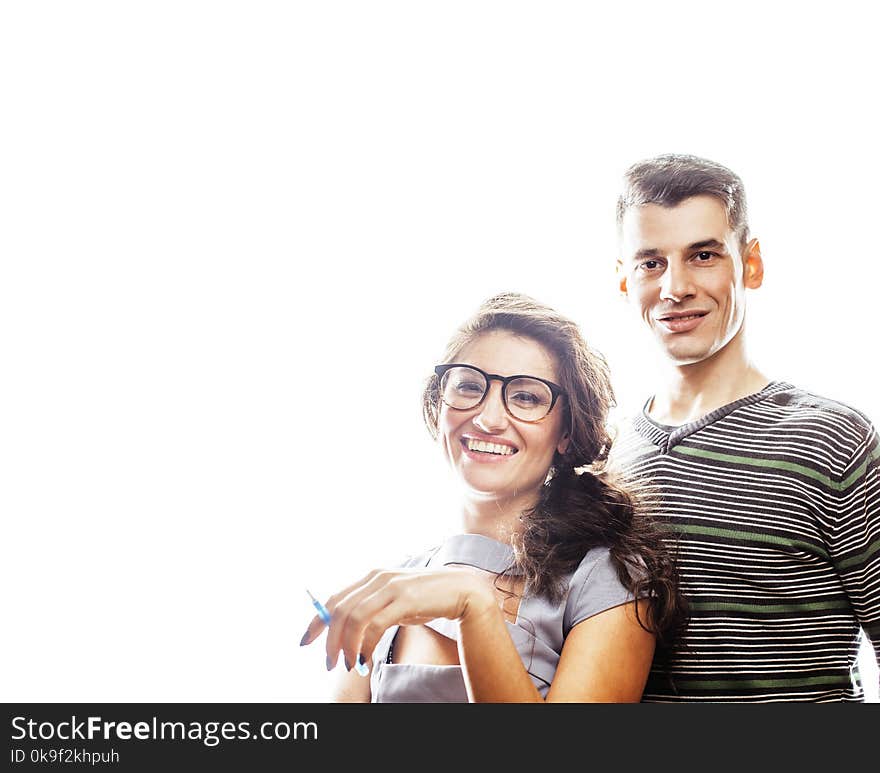 Young pretty teenage couple, hipster guy with his girlfriend happy smiling and hugging isolated on white background, lifestyle people concept close up