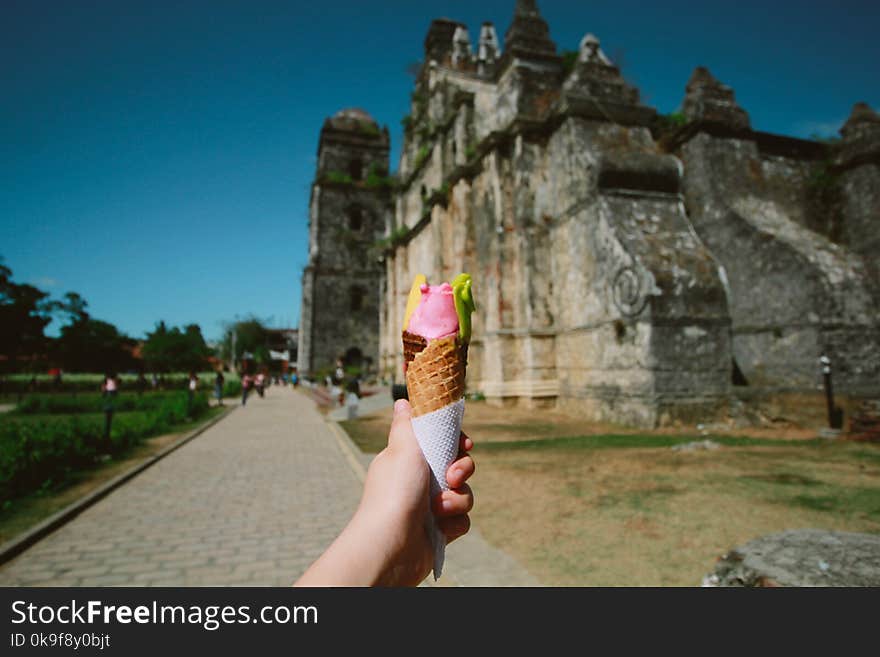 Person Holding Ice Cream With Cone