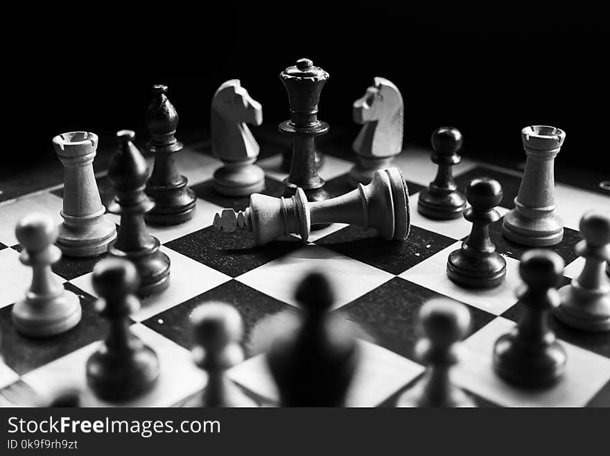 Grayscale Photography Of Chessboard Game