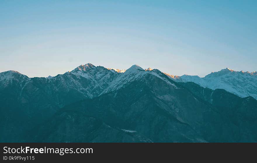 Landscape Photography Of Snow Capped Mountains