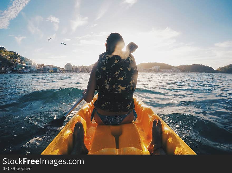 Woman Wearing Floral Vest Ride on Boat