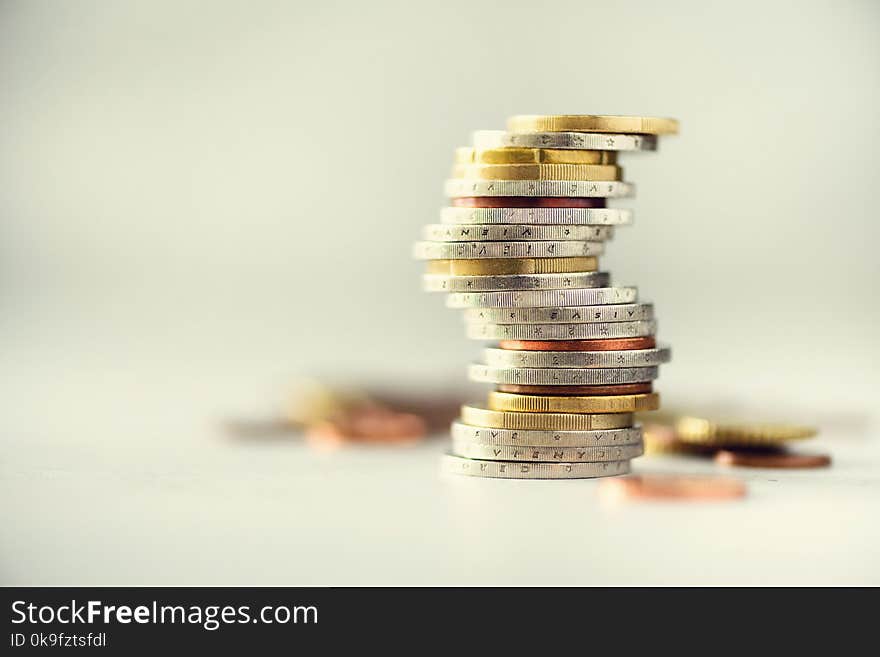 Euro money, currency. Success, wealth and poverty, poorness concept. Euro coins stack on grey background with copy space.