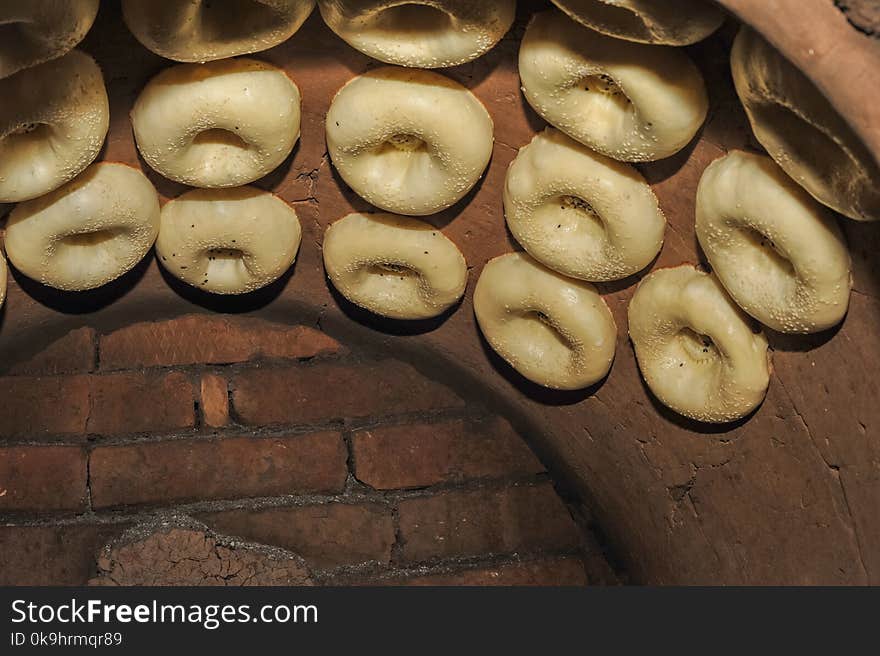 Process of cooking tandoor bread national Uzbek flatbread