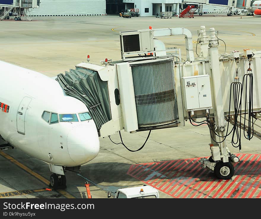 Passenger Boarding Bridge connected to airplane