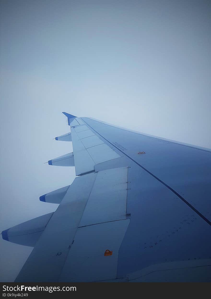 The picture shot from aeroplane of the vast blue sky. The picture shot from aeroplane of the vast blue sky.