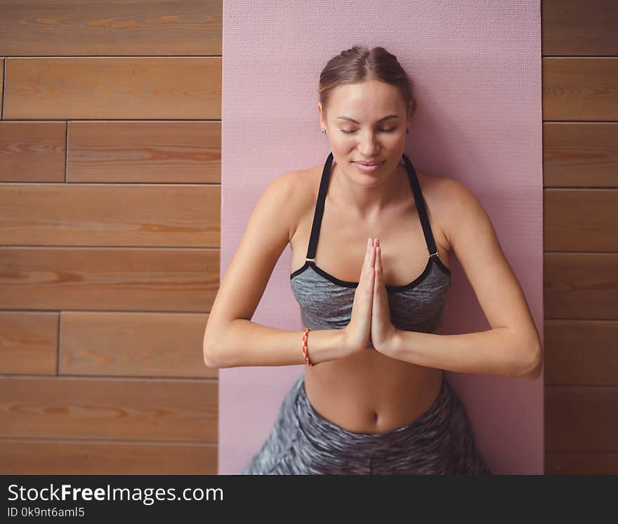 Attractive girl meditating close up. Attractive girl meditating close up