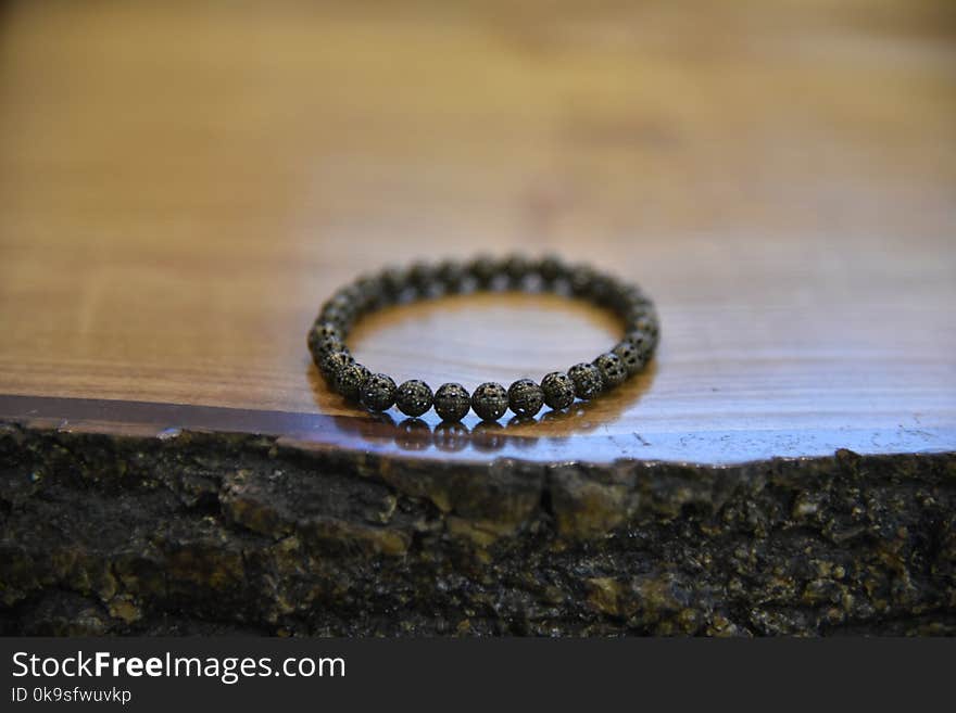 Beaded Gray Bracelet on Table