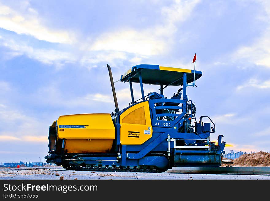 Photo Of Blue And Yellow Truck