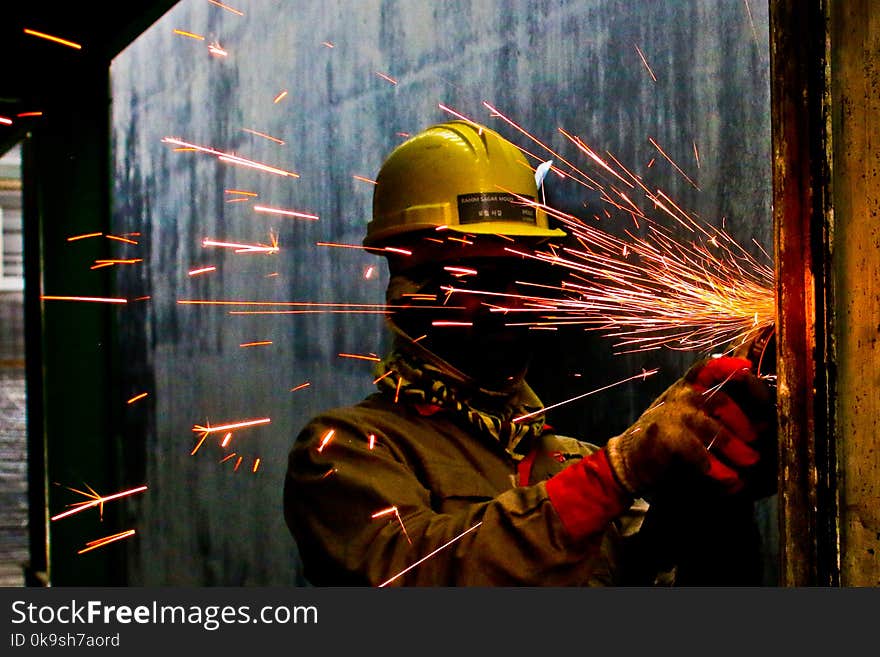 Man Wearing Yellow Safety Helmet