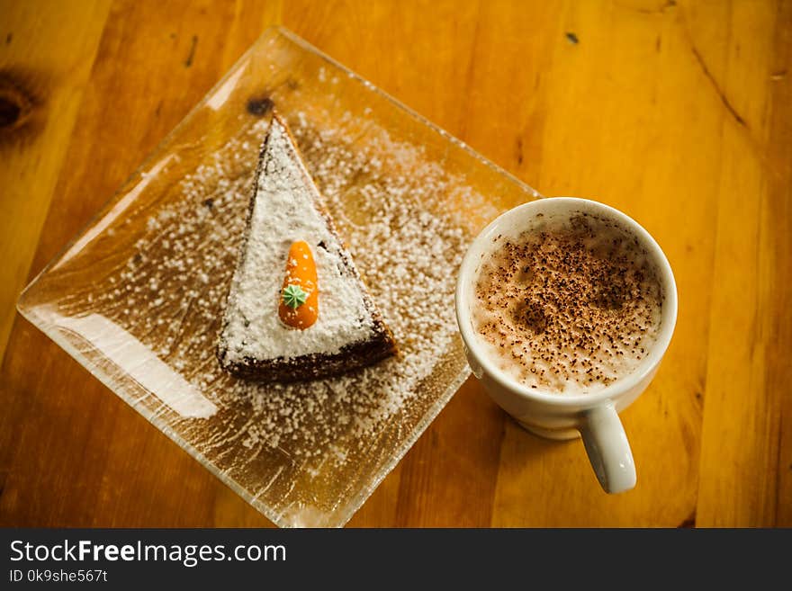 White Ceramic Cup And Dessert