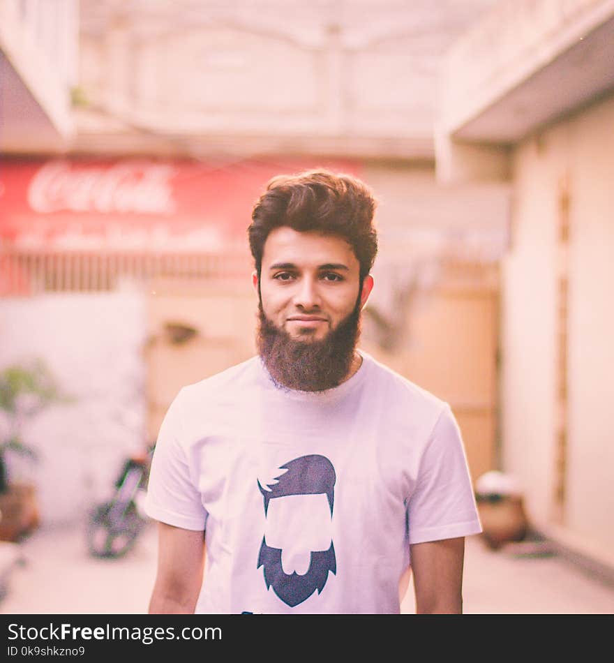 Man Wearing White Crew-neck T-shirt