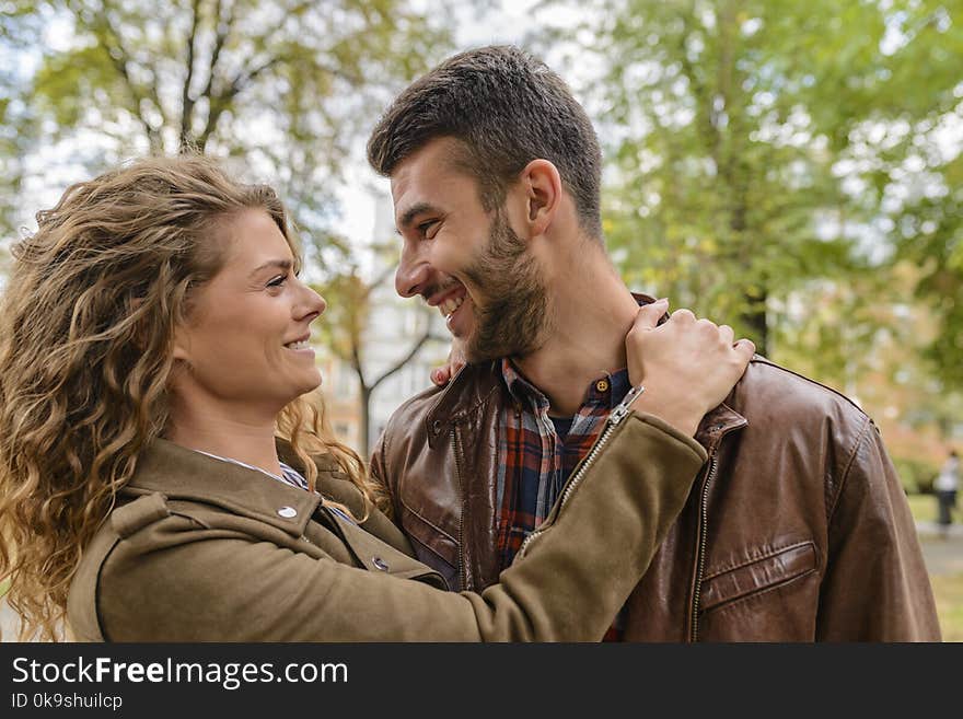 Photography of a Couple Smiling