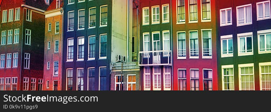 Multicolored rainbow houses. Traditional old buildings in Amsterdam, the Netherlands