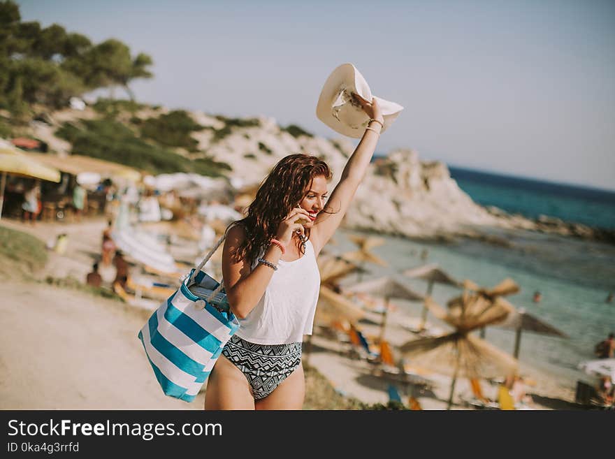 Pretty Young Woman On The Beach