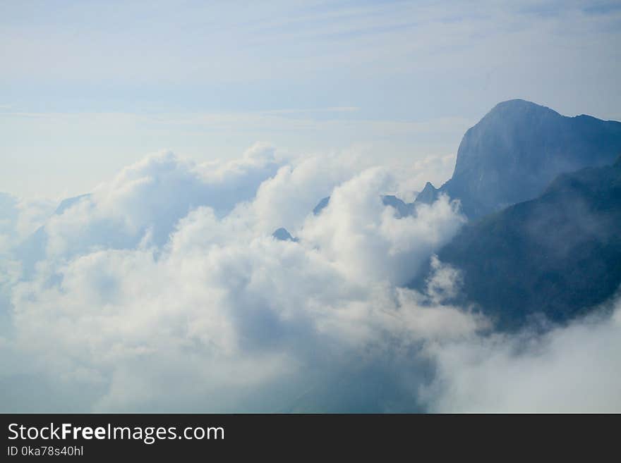 Clouds Formation on Top of Mountain Photography