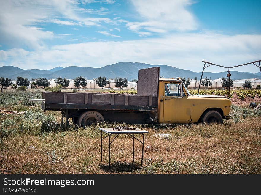 Yellow Truck On Field