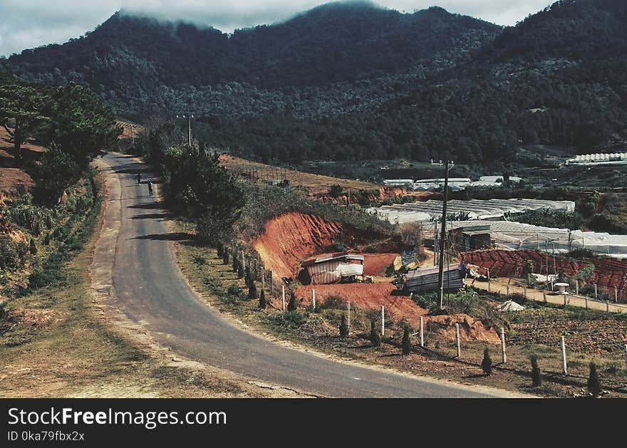 Concrete Road Near Mountains