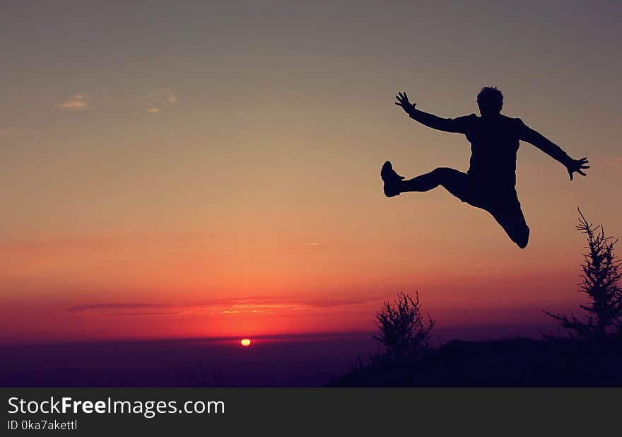 Silhouette Of A Jumping Man