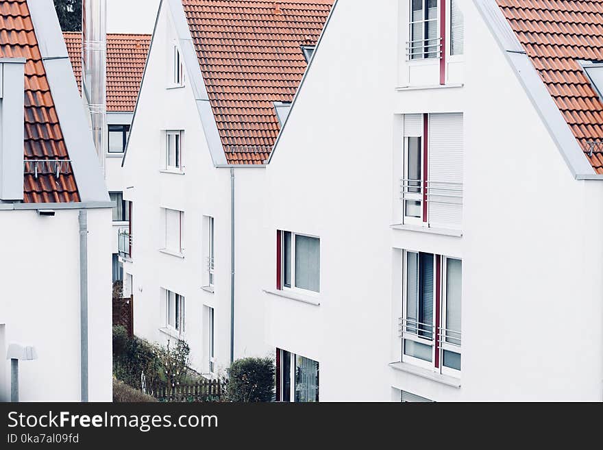 Photo of White Concrete Houses at Daytime