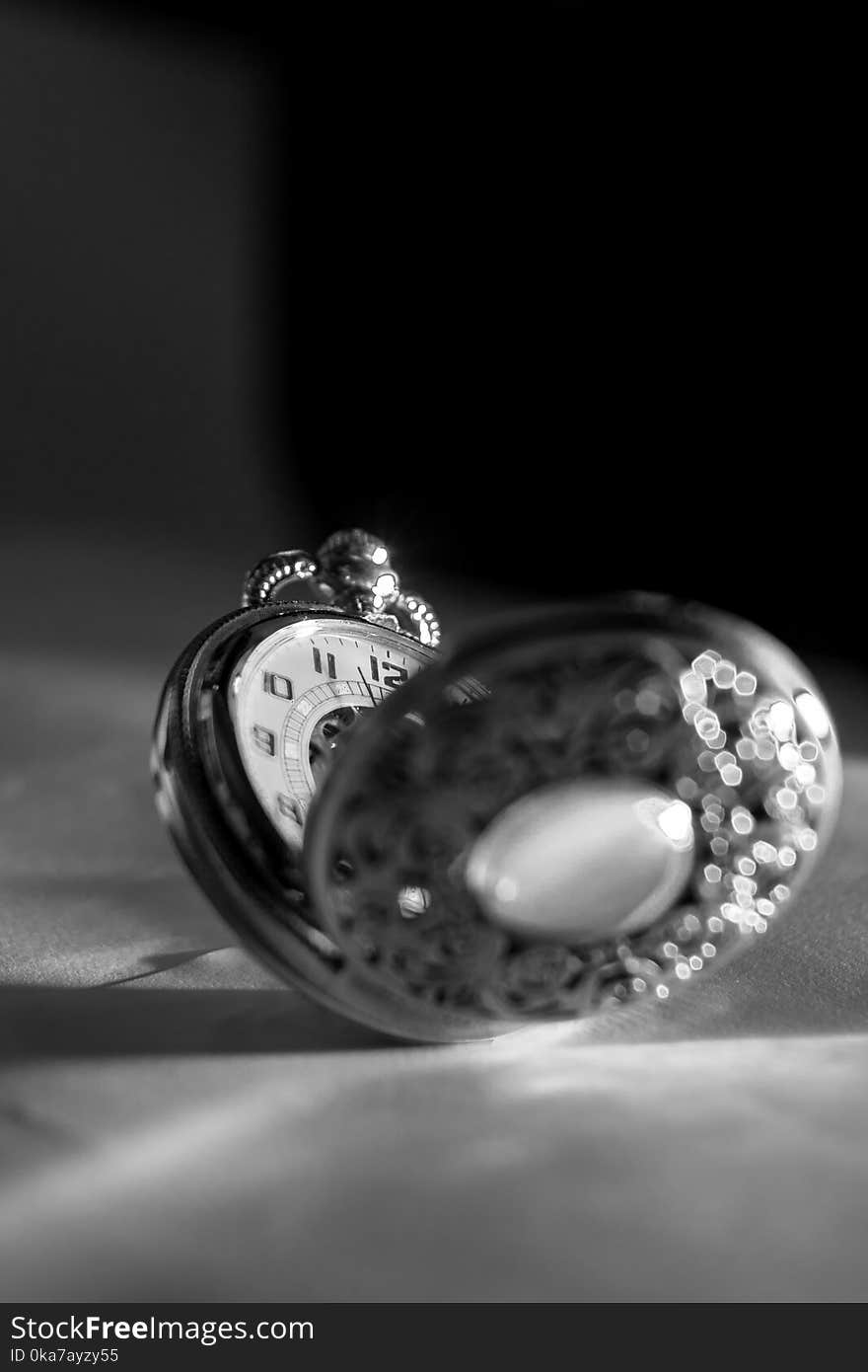 Grayscale Photo Of Pocket Watch