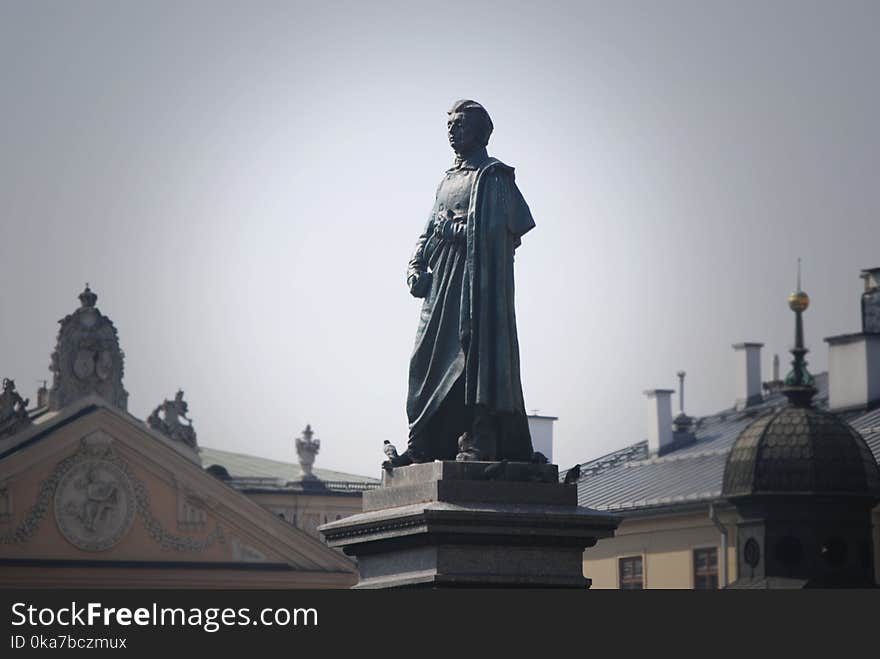 Woman In Dress Statue