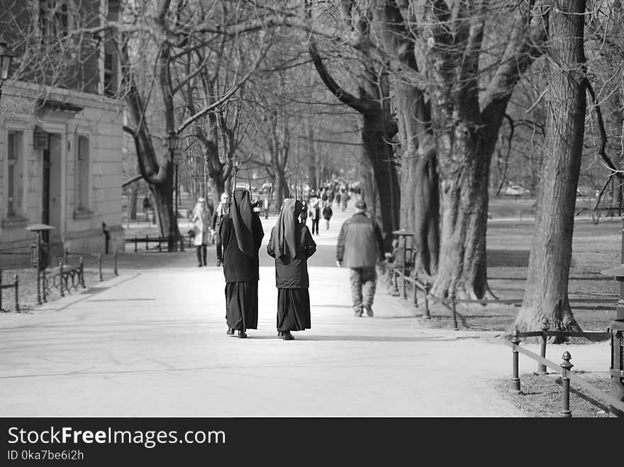 Grayscale Photo Of Two Nuns