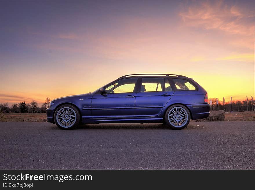 Side View Photography of Car During Dawn