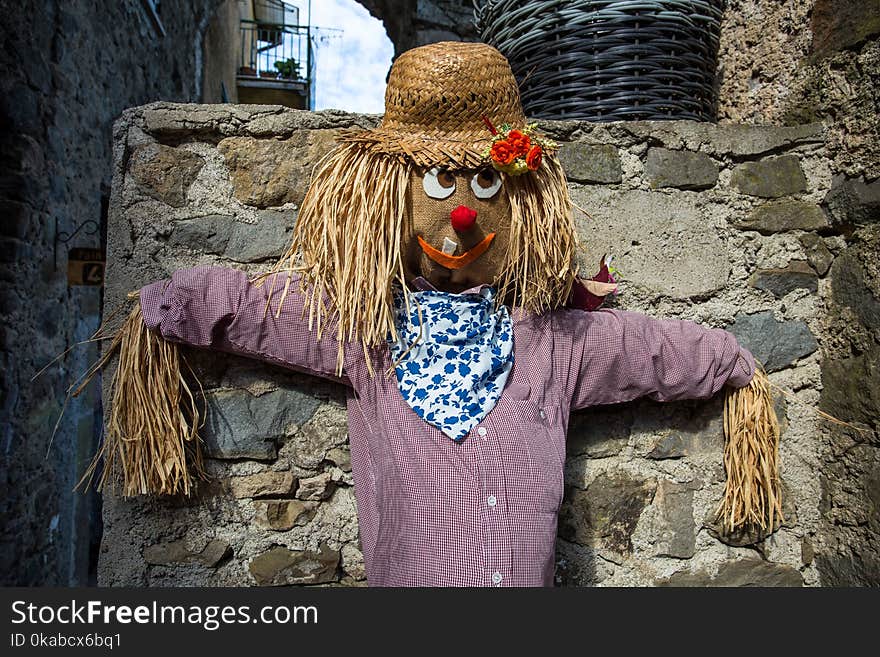 Italian scarecrow close up in a village, Italy. Italian scarecrow close up in a village, Italy