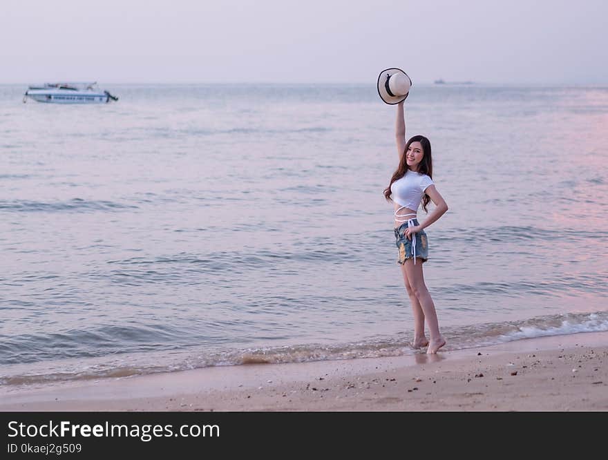 Portrait of woman enjoy on sea beach