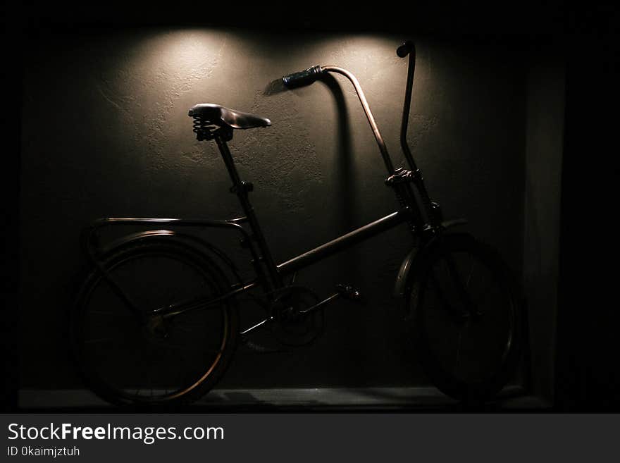 Stylish hipster bicycle in modern interior of city cafe