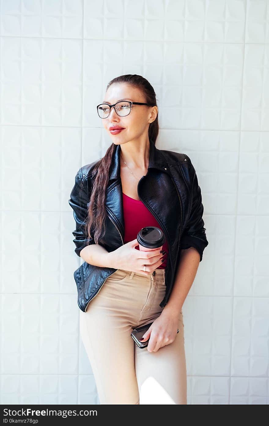 Photo of Woman Wearing Black Leather Jacket