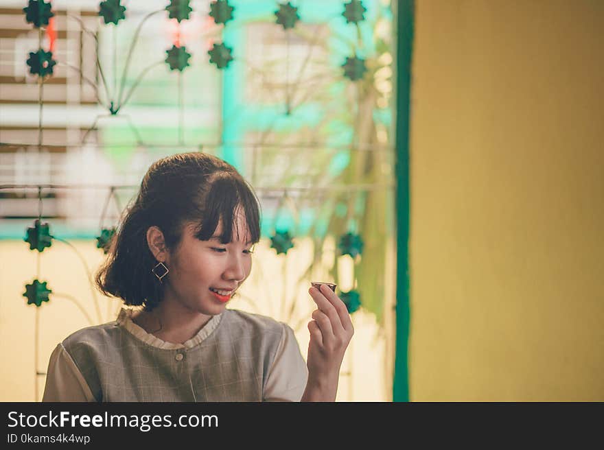 Close-Up Photography of a Woman Smiling