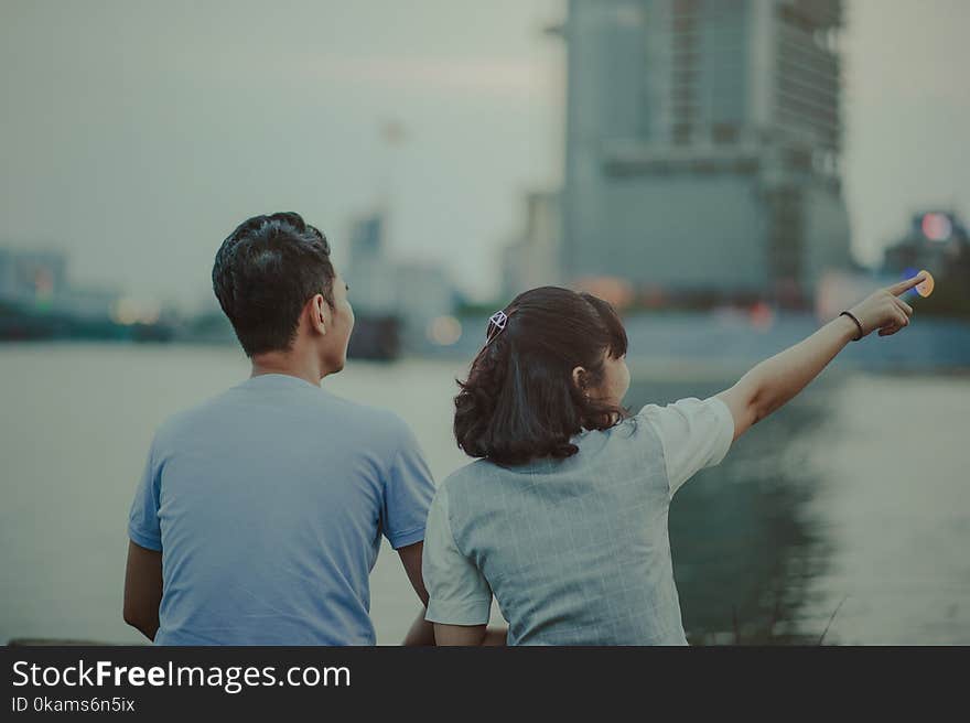 Woman Wearing White Shirt and Man Wearing Blue Shirt