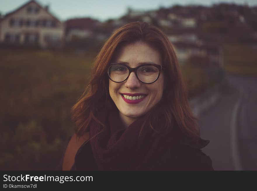 Closeup Photo of Woman Wearing Eyeglasses