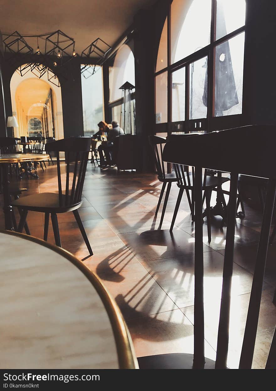 Photo of Black Wooden Dining Chair on Restaurant