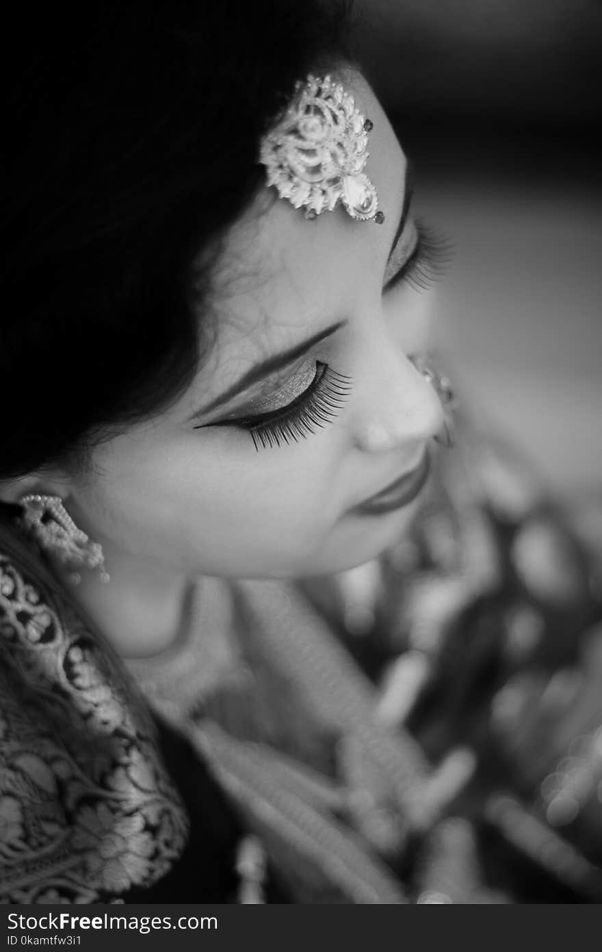 Grayscale Photo of Woman Wearing Indian Traditional Dress