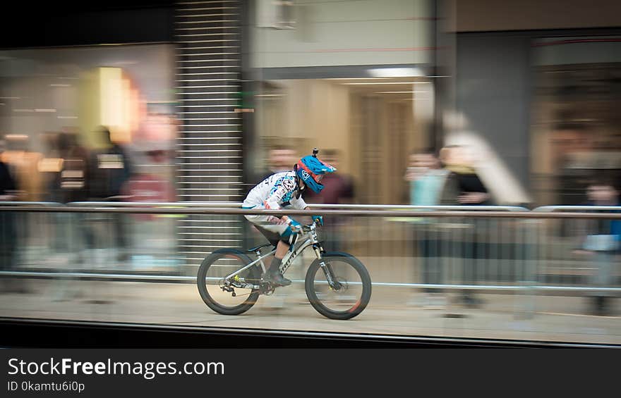 Time-lapse Photography of Man Riding Bicycle