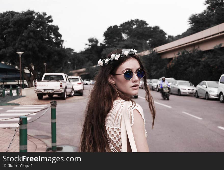 Photography of a Woman Wearing Vintage Sunglasses