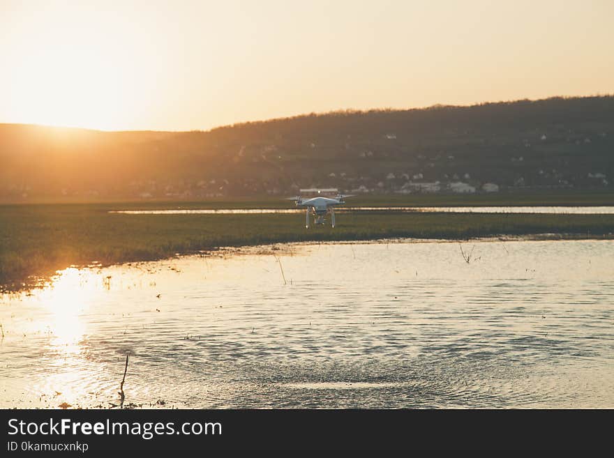 Photo of Drone Flying above the Lake