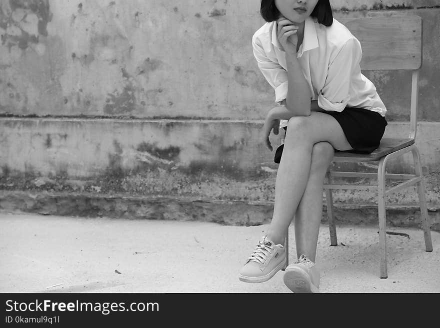 Grayscale Photography of Woman Wearing White Shirt And Black Skirt