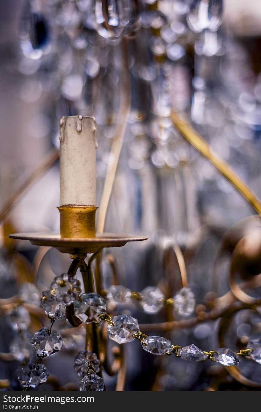 Person Taking Photo of Brown Steel Chandelier