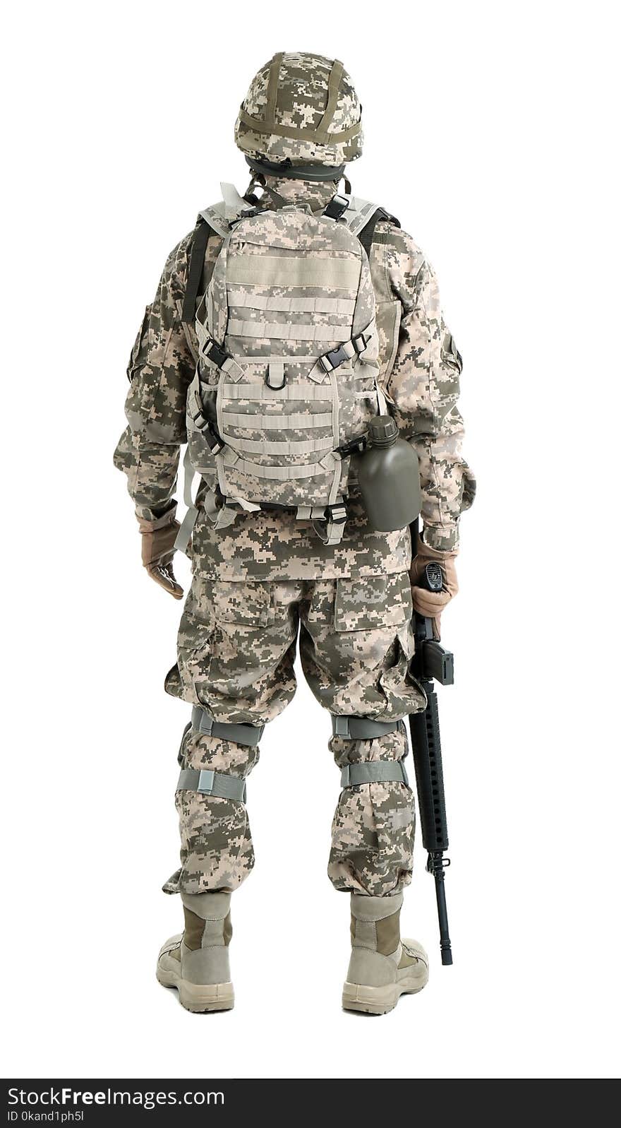 Male soldier with machine gun on white background