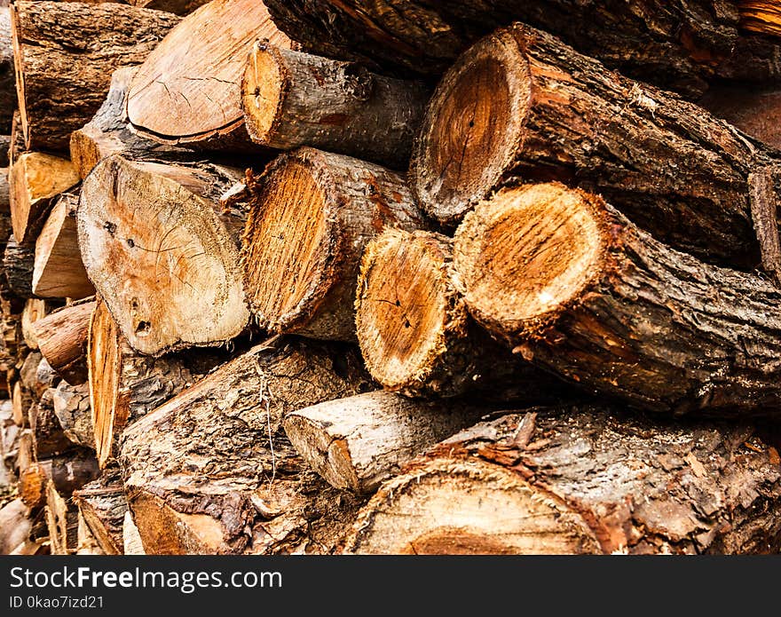 Cross sectional wooden log pile background, construction material or interior concept.