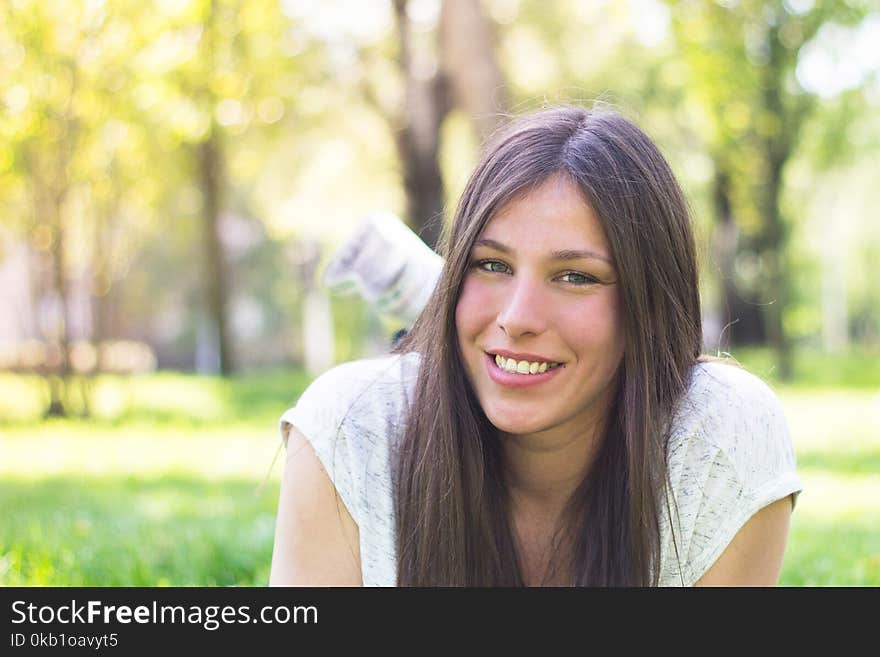 Beautiful sunny day, smiling woman portrait