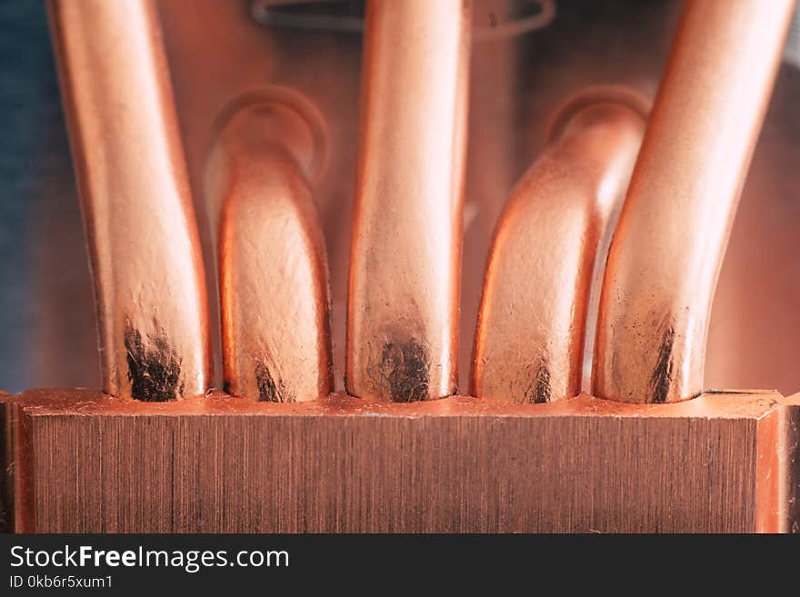 Aluminum radiator with copper heat pipe close-up with beautiful bokeh