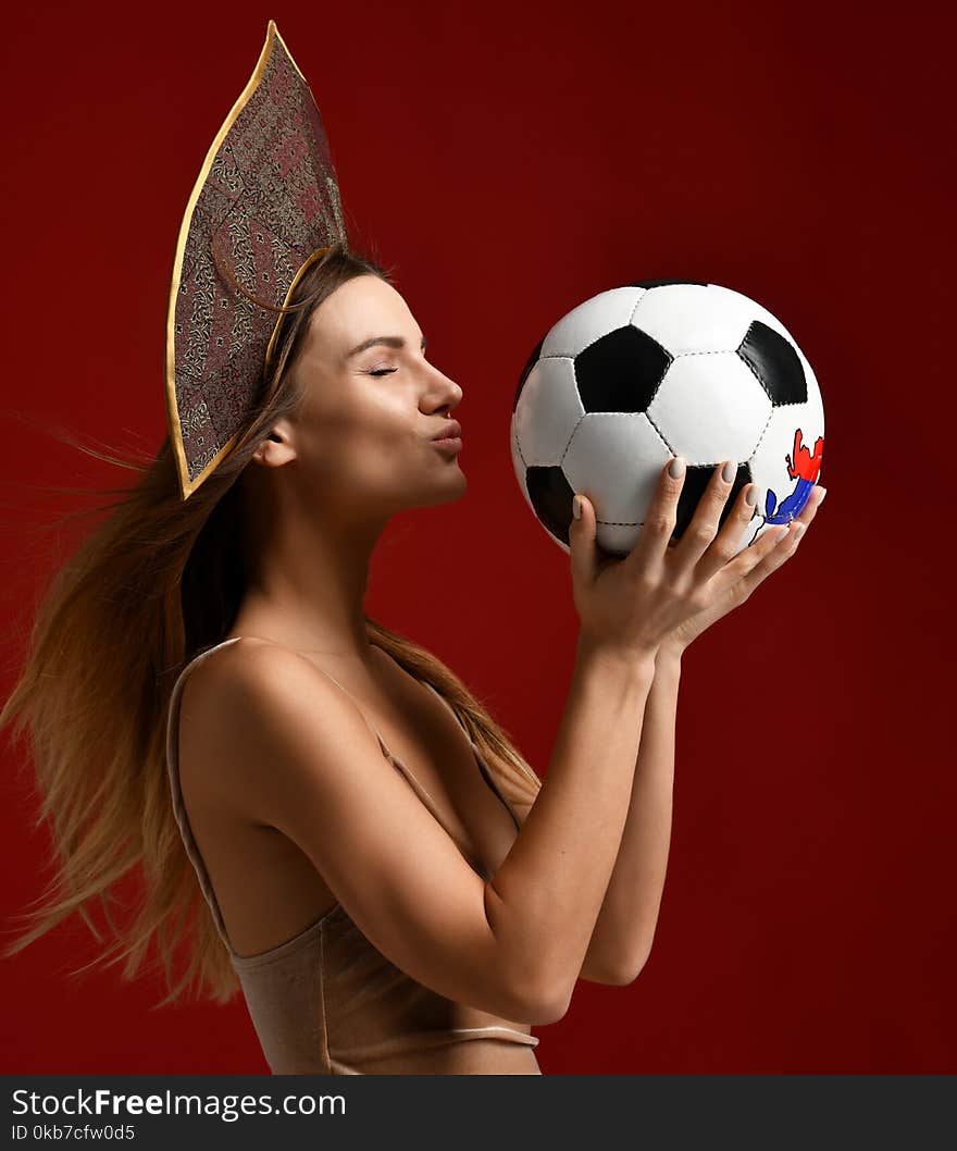 Ruusian style Fan sport woman player in kokoshnik hold soccer ball celebrating happy smiling laughing