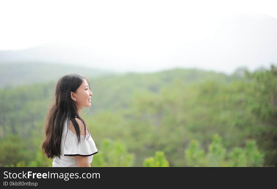 Photo of Woman Wearing White Top