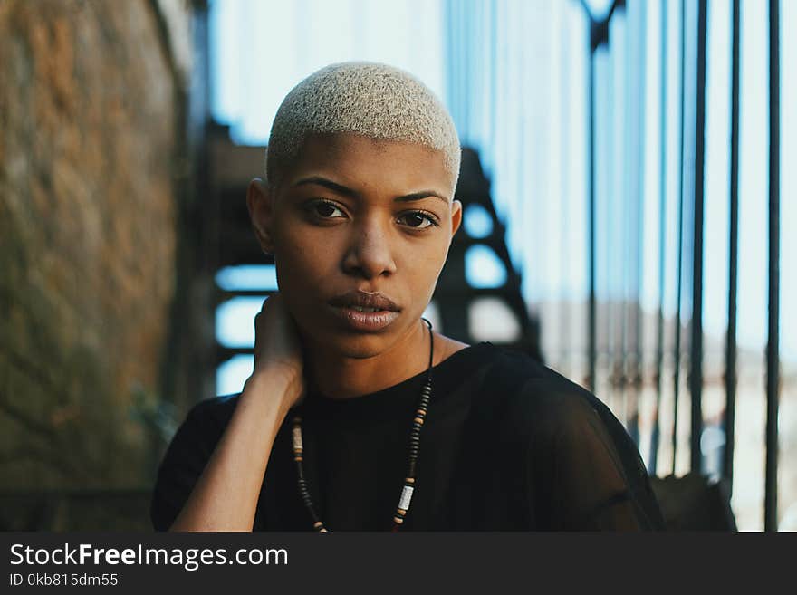 Shallow Focus Photography of Woman in Black Shirt